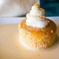 Tres Leches Cake · Three-milk sponge cake, whipped cream.