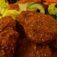 Falafel Plate · Six fried veggie patties, served with hummus and a choice of salad. Includes a house salad a...