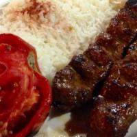Beef Kabob · Two skewers of beef tenderloin pieces marinated in olive oil and spices with grilled onions,...