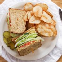 Veggie Sandwich · Avocado, Swiss cheese, lettuce, cucumber, tomato and almonds on whole wheat.