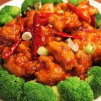 General Chicken · Hot and spicy.  Tender chunks of boneless chicken lightly crisped, served with a tingling sp...