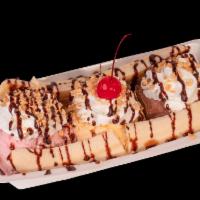 Banana Split · Favorite. vanilla, chocolate and strawberry ice cream with split banana drizzled with strawb...