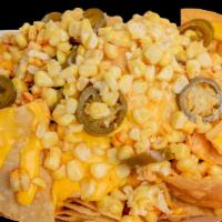 Nachos Con Elote / Corn Nachos · Favorite. Nacho chips with nacho cheese, cotija cheese, jalapenos and all topped with corn.