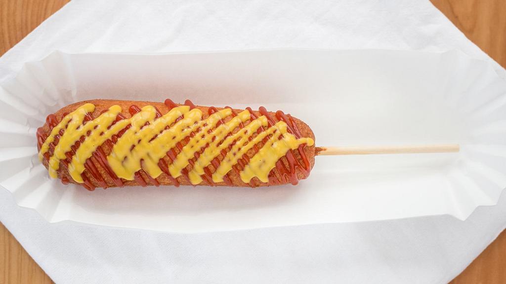 Original Plain Corn Dog · 100% Beef sausage.
House made honey batter with cornmeal & buttermilk.
Served with ketchup & mustard. Add Half cheese half sausage for an additional charge.