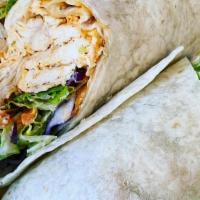 Buffalo Chicken Wrap · roasted chicken, lettuce, tomatoes, house made buffalo sauce, wrapped in a big giant tortill...