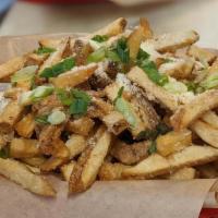 Truffle Fries · hand cut french fries, tossed in our special truffle blend, topped with parmesan cheese and ...