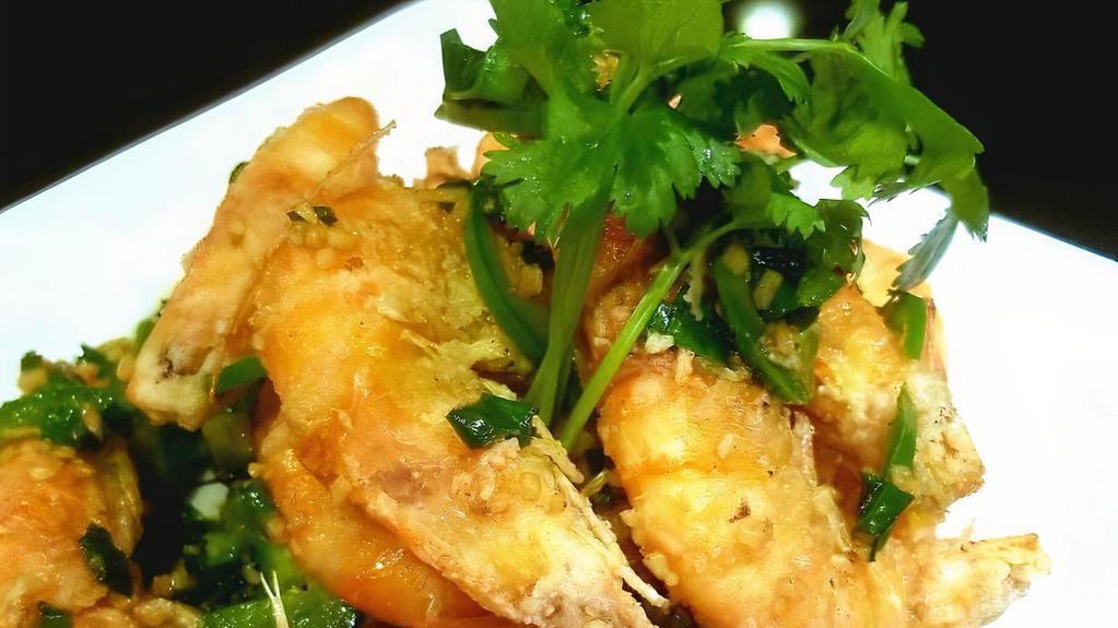 Salt & Pepper Shrimp · Eight pieces. Head-on fried shrimp spiced with jalapenos, garlic, and green onions.