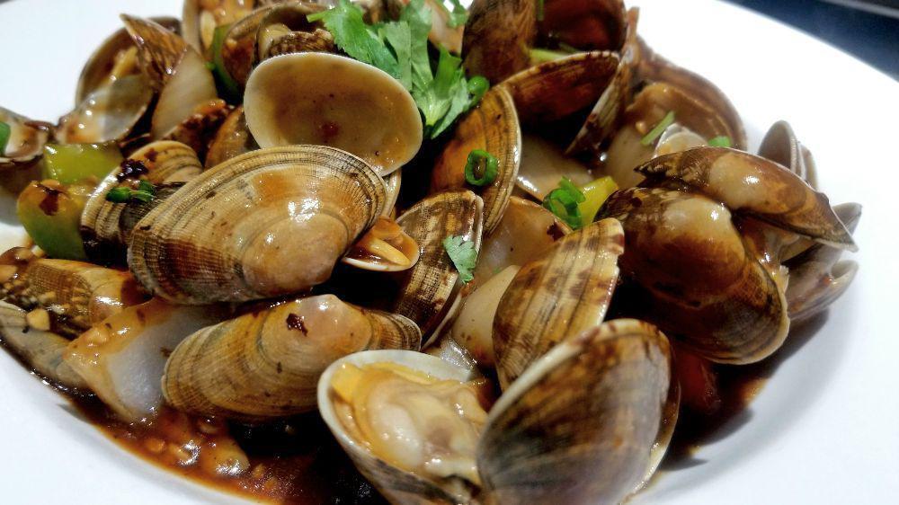 Clams With Black Bean Sauce · Shell-on clams are stir-fried with black bean sauce.