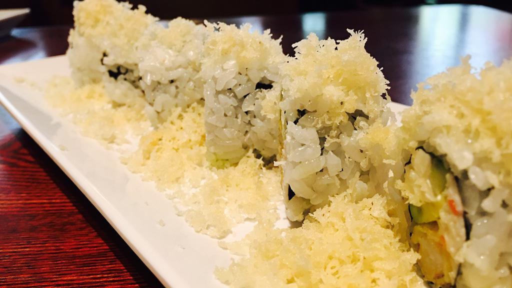 Crunch Roll · In: crabmeat, shrimp tempura, avocado, cucumber, out: tempura flake.