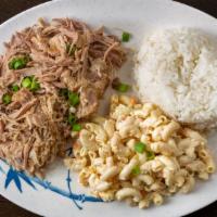 Kalua Pig · Marinated shredded pork over rice and macaroni salad.