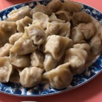 Shredded Seafood Dumplings 三鲜饺子 · Chicken, crab meat and a little shrimp.
