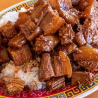 Pork Belly Braised In Brown Sauce Rice 红烧肉盖饭 · Rice comes with pork belly cooked in brown sauce.