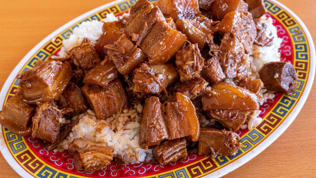 Pork Belly Braised In Brown Sauce Rice 红烧肉盖饭 · Rice comes with pork belly cooked in brown sauce.