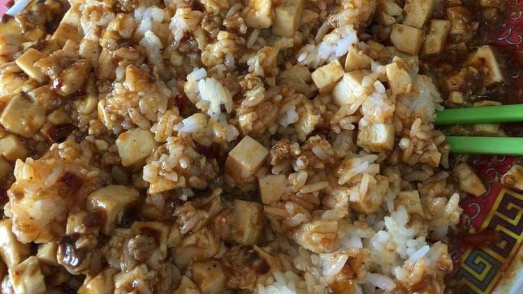 Mapo Tofu Rice 麻婆豆腐拌饭 · Rice comes with tofu and minced pork cooked in spicy sauce.