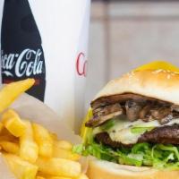 Mushroom Swiss Burger Combo · A 1/4 lb patty with swiss cheese, grilled mushrooms, lettuce, tomato, and onions (Includes a...