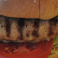 Turkey Burger Combo · A 1/4 lb turkey patty on a wheat bun with lettuce, tomato, and onions (Includes a med fry an...