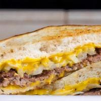 Patty Melt Combo · A 1/4 lb patty served on rye bread with American cheese and grilled onions. (Includes a med ...