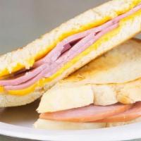 Grilled Ham & Cheese · Served on toasted white bread