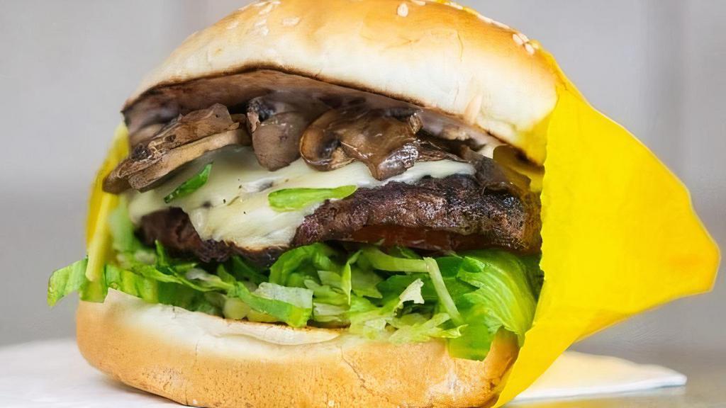 Mushroom Swiss Burger · A 1/4 lb patty with swiss cheese, grilled mushrooms, lettuce, tomato, and onions
