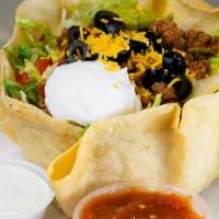 Chicken Taco Salad · Served in a fried shell bowl, including refried beans, grilled chicken, shredded lettuce, di...