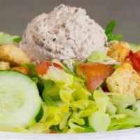 Tuna Salad · Homemade Tuna served on lettuce with tomatoes, cheddar cheese, cucumbers, croutons and your ...