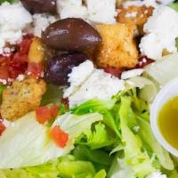 Greek Salad · Lettuce with Greek olives, tomatoes, feta cheese, cucumbers, onions and your choice of dress...