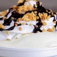 Sundae · Vanilla ice cream topped with your choice of topping, whipped cream and nuts