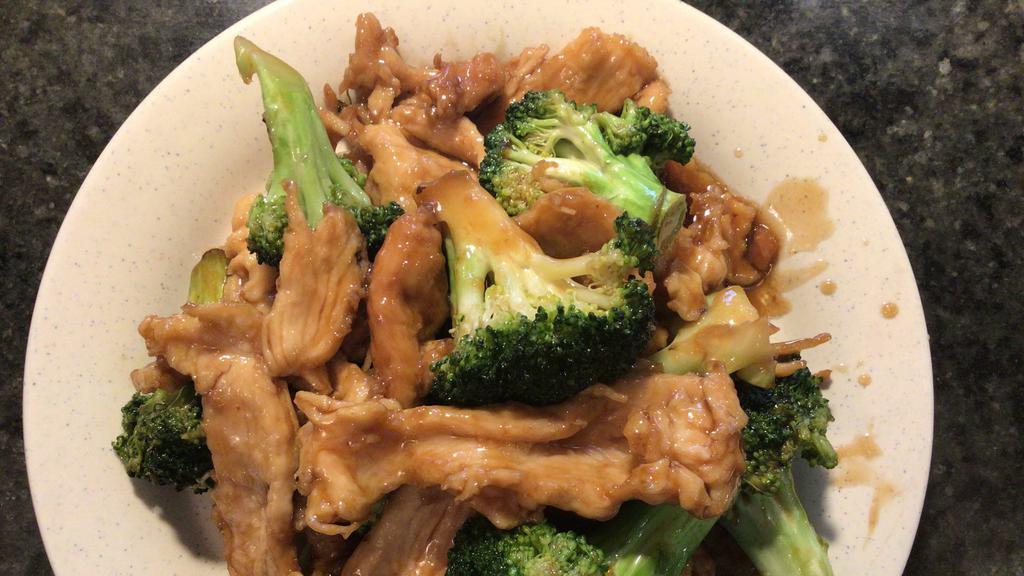 Chicken With Broccoli · Served with white rice.