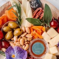 Small Go To Charcuterie Board · Allergens: milk (cheese), tree nuts (almonds, cracker). Classic style cheese and meat board ...