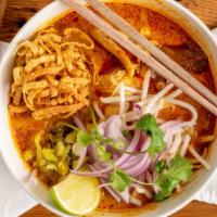 Khao Soi / ข้าวซอย · Medium. A northern-style curry noodle soup. Egg noodles in a coconut milk curry of cumin, tu...