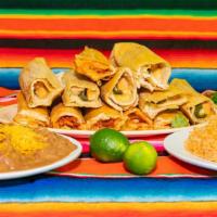 Tamale Dinner · Feeds up to six people. Twelve tamales, with delicious rice, and beans. Pork, Chicken, BBQ P...