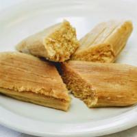 Tamale Plate · Tamale of your choice and side of rice and beans