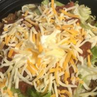 Ground Beef Bowl · Ground Beef, Rice, Beans, Lettuce Cheese, pico de gallo, Sour Cream.