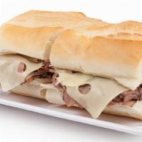 French Dip · fresh sliced roast beef / swiss cheese / on a toasted baguette with au jus for dipping