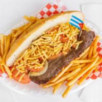 Pan Con Bistec · Steak with onions, tomatoes, mayonnais, and shoe string potatoes. Side of french fries.