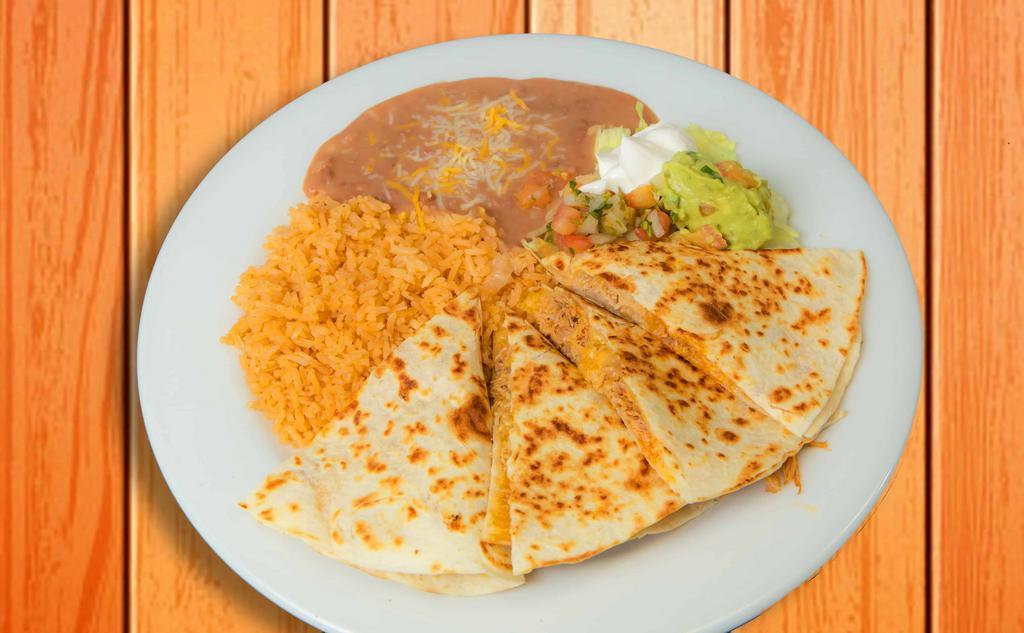 Quesadilla Plate · Flour tortilla filled with melted cheese and your choice of meat, with sour cream, pico de gallo, and guacamole. served with rice & beans.