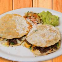 Mulitas · Layered jack and cheddar cheese and your choice of meat between two corn tortillas. Topped w...