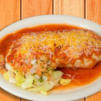 Wet Burrito · Flour tortilla filled with your choice of meat, rice, and beans, topped with our special sau...
