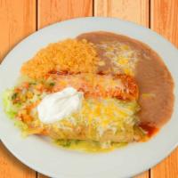 Tamal Enchilada Plate · Tamal filled with pork or chicken and corn tortilla enchilada filled with your choice of mea...