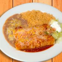 Enchiladas Rancheras · Two corn tortillas filled with your choice of meat and topped with our salsa ranchera, melte...
