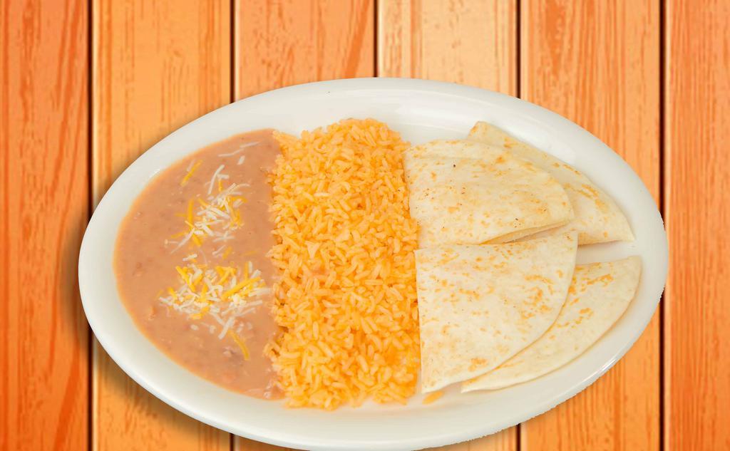Kids' Quesadilla · Make your own with only cheese or your choice of chicken or carne asada served with rice and beans or French fries. Kids' size beverage included.