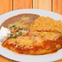 Chile Relleno · Stuffed Pasilla Pepper filled with mozzarella cheese. Served with rice and Beans.