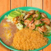 Camarones Al Mojo De Ajo · Shrimp sautéed with butter, garlic, bell pepper, onion, mushrooms, and spices. Served with p...