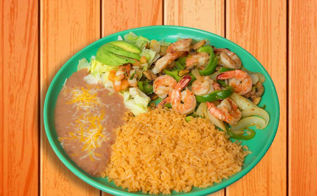 Camarones Al Mojo De Ajo · Shrimp sautéed with butter, garlic, bell pepper, onion, mushrooms, and spices. Served with pico de gallo and avocado, and rice & beans.