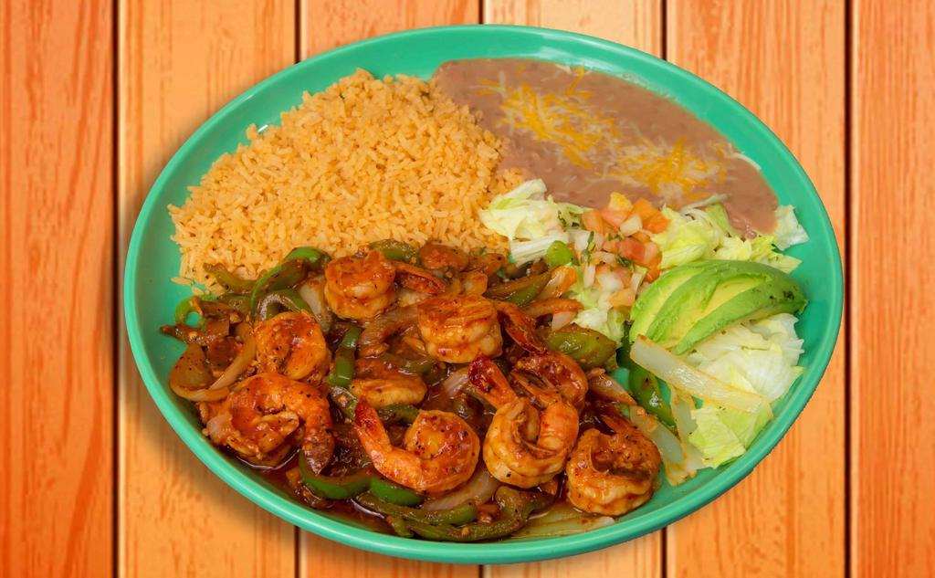 Camarones À La Diabla · Shrimp sautéed in authentic homemade sauce, bell peppers, mushrooms, onions. Served with rice & beans.
