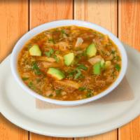 Chicken Tortilla Soup · Savory tomato broth, chicken, tortilla chips, fresh avocado, and shredded cheese, onions, an...