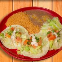 Fish Tacos Plate · Three corn tortillas, topped with grilled fish, shredded lettuce, topped with pico de gallo,...