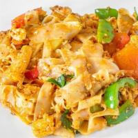 Drunken Noodles · Stir-fried rice noodle with eggs, tomatoes, bell peppers, bamboo shoot, baby corn and fresh ...