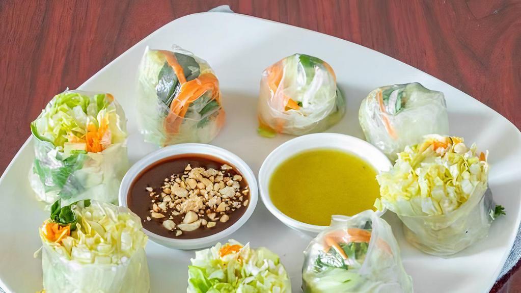 Fresh Basil Rolls · Fresh basil, carrot, cucumber, cilantro, noodle wrap with rice paper, served with plum sauce and green sauce. Add shrimp for an additional charge. Gluten free option - served with sweet chili sauce
