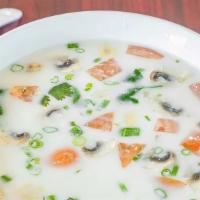 Tom Kha Gai · Coconut milk, chicken, galangal, mushrooms, lime, lemon grass, cilantro and green onions